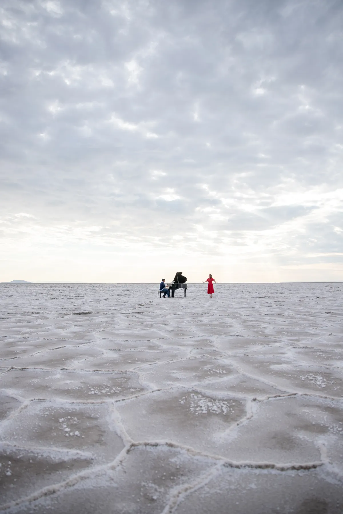 Bonneville Salt Flats editorial — grand piano against the western horizon.