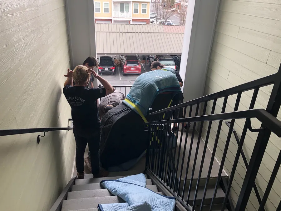 A Safe and Sound Pianos crew on a piano move at a Utah customer location.