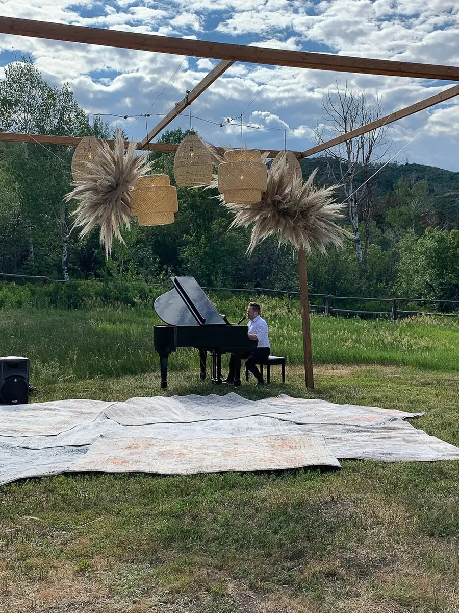 Wrapped piano staged for transport during a Salt Lake Valley move.