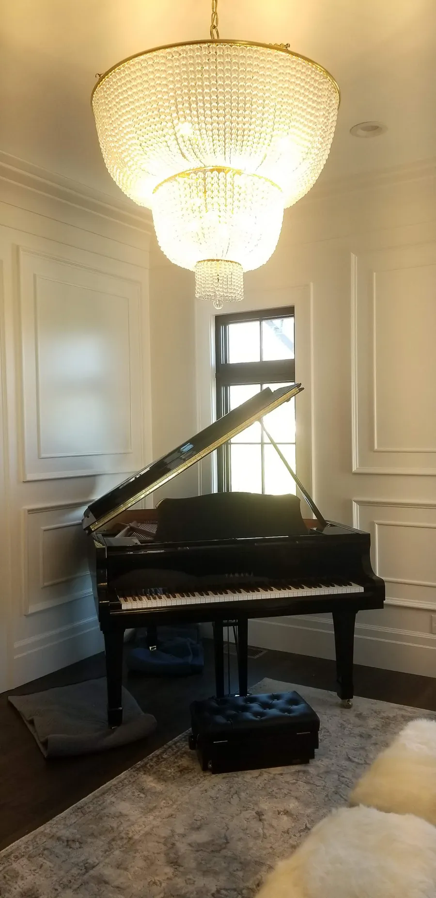 Piano wrapped and ready for transport on a Utah job site.