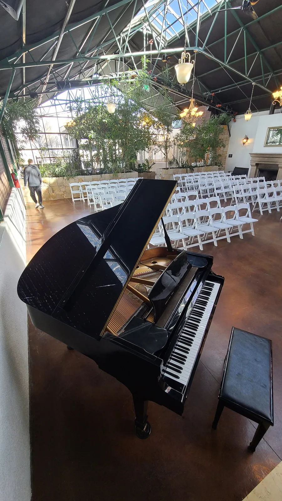 Crew handling a piano at a Utah residence during a March 2021 job.