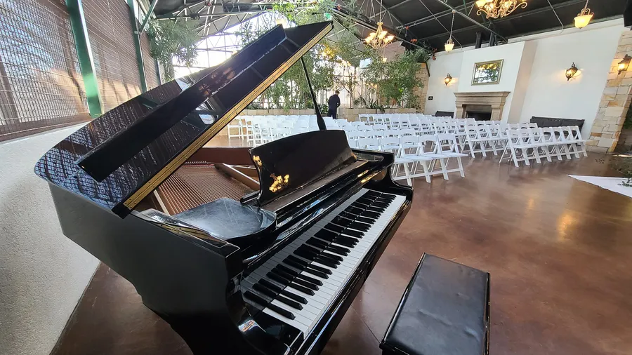 Wrapped piano staged for the next leg of a March 2021 move.