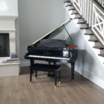 grand piano set up in new home in bluffdale utah